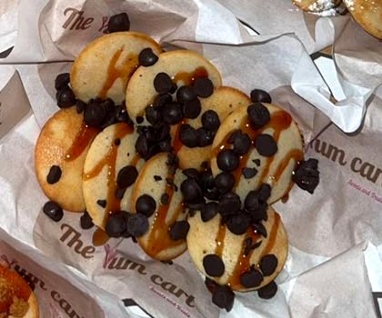 Mini pancakes with chocolate chips and a drizzle